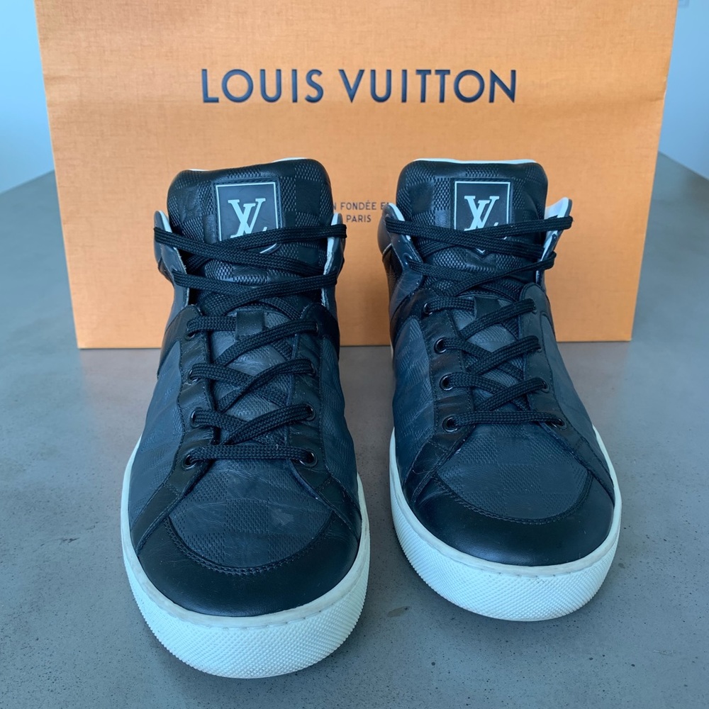 Louis Vuitton leather sneakers.